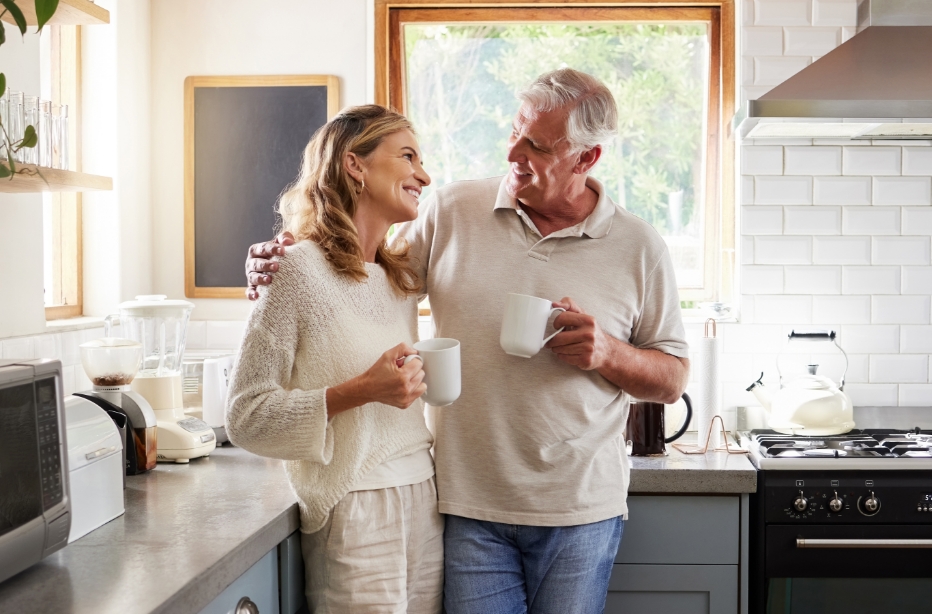 Woman in the dental chair grinning at her dentist in Falmouth